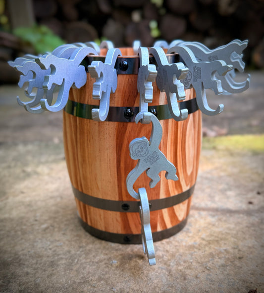 Barrell of monkey shaped bottle openers