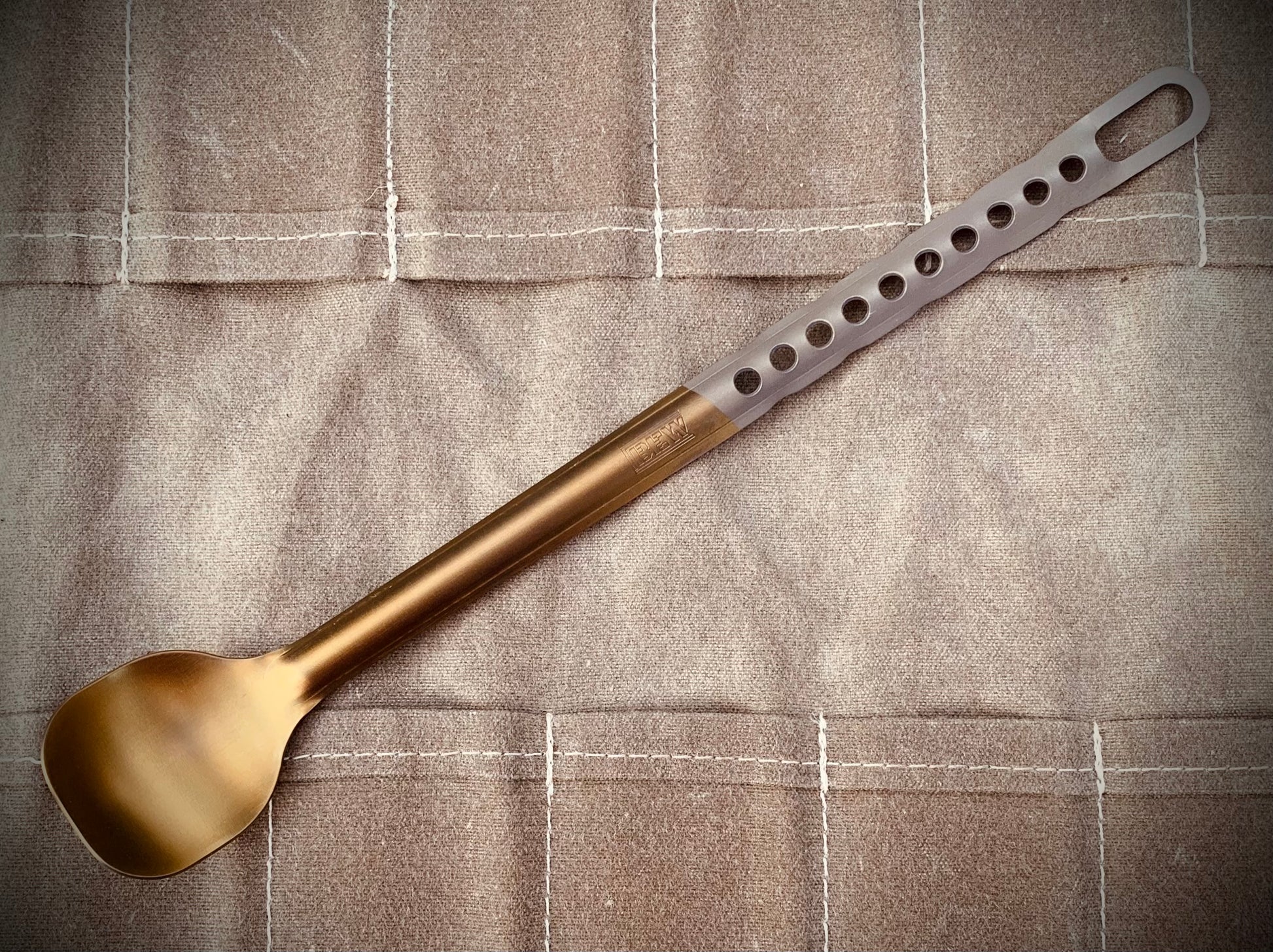 Marten Long Titanium Spoon shown in bronze color