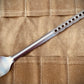 Marten Long Titanium Backpacking Spoon shown in raw titanium