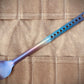 Marten Long Titanium Spoon with a light purplish heat anodized colorway