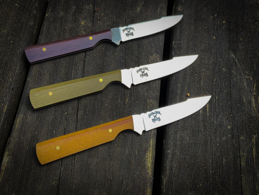Bonds Creek Knives Fin & Feather, showing three color options on the handle, burgundy, green, and yellow 