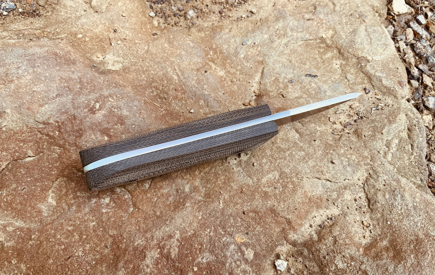 Kerf Carver Knife with Micarta Scales showing Knife Spine