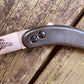 Woods Monkey Banana Peel folding knife for wearing in a neck sheath