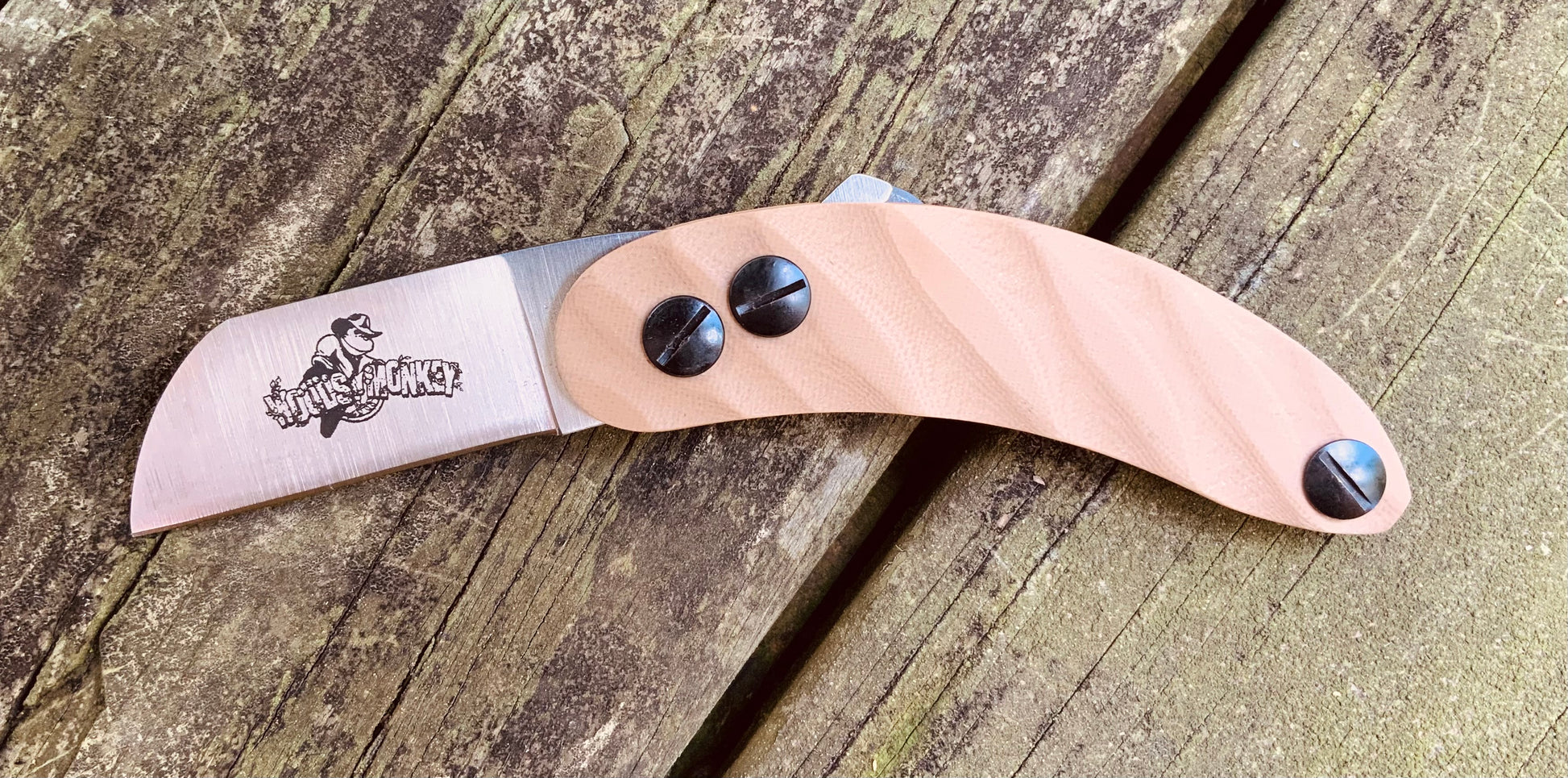 Woods Monkey Banana Peel folding knife with AEB-L steel Wharncliffe blade and Coyote G10 handle scales
