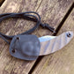 Bushcraft Neck Knife shown in Sheath with cord