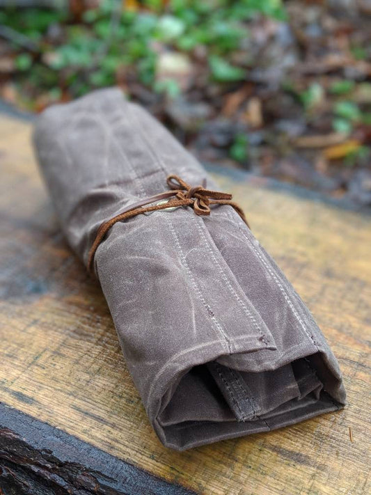 Kestrel Waxed Canvas 16 Pocket Tool Roll, rolled up for packing or travel